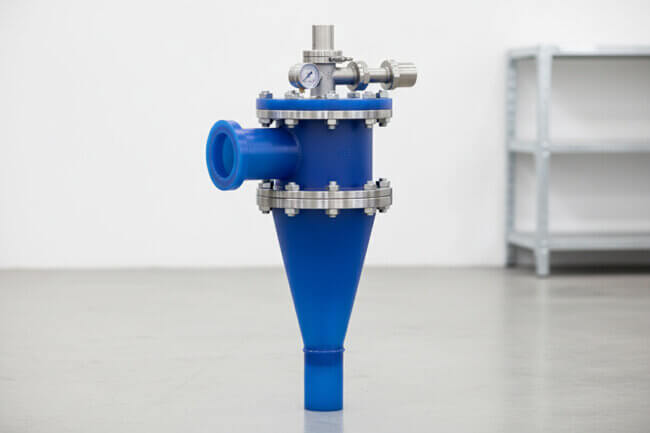 Conical hydrocyclone separator with tangential feed inlet and apex discharge for centrifugal separation of suspended solids